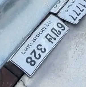 รูปป้าย 2ฌท 556 ที่ตัดจากรูปของผู้แจ้ง
