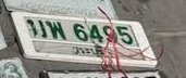 รูปป้าย มพ 6495 ที่ตัดจากรูปของผู้แจ้ง