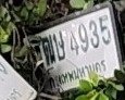 รูปป้าย ฒษ 4935 ที่ตัดจากรูปของผู้แจ้ง